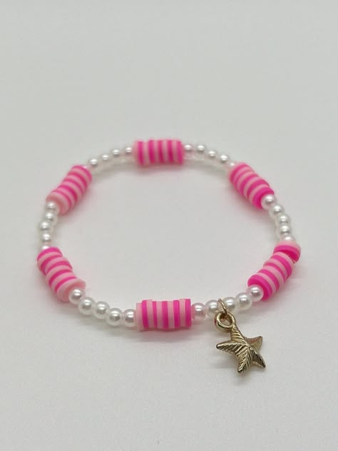 Handmade 7 in. preppy beaded bracelet. Contains pink and light pink 6mm beads. This bracelet also has cute pearl beads, and a starfish charm! I think this bracelet is perfect for summer, or any time of the year! You can buy this for yourself, or as a gift! I can custom create a bracelet for you. Just let me know what colors you want, and if you want a word on your bracelet. I can also make phone charms and rings. Clay Beads Design Ideas, Pink Bracelets Ideas, Polymer Clay Bead Ideas, Cute Bracelet Ideas For Summer, Clay Braclets Idea, Cute Bracelets Ideas Beads, Bracelet Ideas Summer, Summer Bracelet Ideas, Ideas Para Pulseras