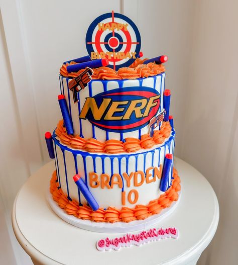 Nerf! 🧡💙 Nerf Cake Ideas, Nerf Birthday Cake, Nerf Party Food, Nerf Birthday Party Ideas, Nerf Cake, Birthday 10, Nerf Birthday Party, Nerf Party, Having A Blast