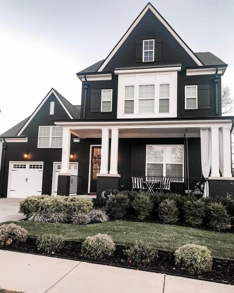 Totally obsessed with our home. Going with black brick is bold but its beautiful. Black Brick And White Siding, Brick Painted Black, Lake Cottage Exterior, White Brick House Exterior, Black Brick House Exterior, Modern Exterior Paint, Black Brick House, Tricorn Black, Black Brick Wall