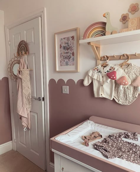 The little mushrooms 🍄 on the baby shirt is sooo cute! 💕 #babyroom #babygirl #kidsroom #nurserydecor #babyroomdecor #kidsroomdecor #macrame #interiordesign #babyclothes #babyfashion #nurseryinspo #babyshop #babyroomideas #momlife #momgoals #momsofig #ArcticPaw Nursery With Wainscoting, Mauve Nursery, Sunroom Playroom, Baby Girl Nursery Ideas, Kids Bedroom Makeover, Girl Nursery Ideas, Style In 2023, Baby Zimmer