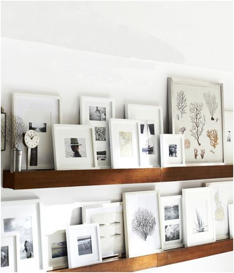 15 Fresh Frame Ideas | I love love love this! The frames should all be in one extreme white, or varying shades and "ages" of white...Imagine on dark shelving with shelf lights aimed down towards them, with a dramatic color for the backdrop (or even a slight ombre of color behind the shelving? would have to be barely noticeable so as not to take away from the frame statement) Frames On Shelf, Picture Ledge, Frame Ideas, Frame Shelf, Hanging Frames, Wall Gallery, Apartment Therapy, House Inspiration, Home Deco