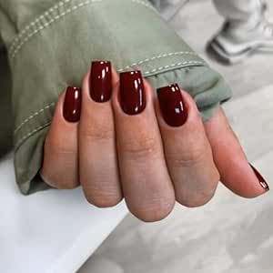 this product is a 24-piece set of wine red press-on nails with a short to medium square shape. They can be applied with adhesive or pressed on and are suitable for the fall and winter seasons. They are reusable and intended for women who desire a stylish and convenient manicure option. Short Coffin Acrylic Nails, Nails Short Medium, Solid Nails, Dark Color Nails, Burgundy Acrylic Nails, Nails Short Coffin, Coffin Acrylic Nails, Red Gel Nails, Dark Red Nails