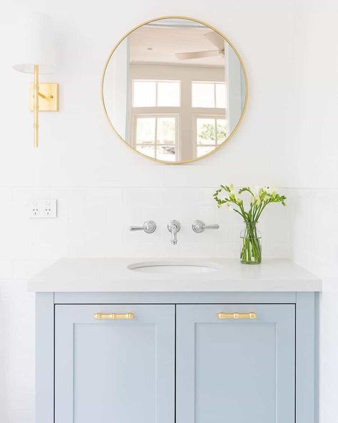 Maximize your small bathroom with coastal decor ideas. Learn how to incorporate beachy elements and clever design tips to create a charming, space-efficient seaside bathroom. Small Coastal Bathroom, Coastal Bathroom Ideas, Modern Coastal Bathroom, Coastal Bathroom Design, Blue Bathroom Vanity, Beach House Bathroom, Coastal Bathroom, Blue Vanity, Beach Theme Bathroom