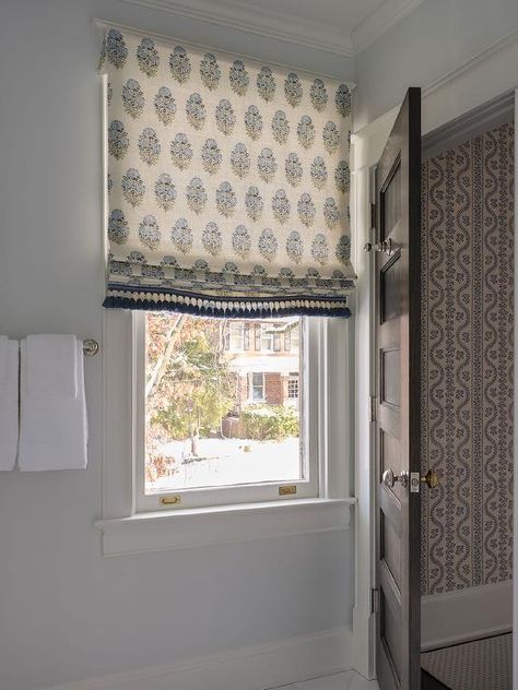 A blue and green block print roman shade covers a window in a beautifully styled powder room. Block Print Roman Shades, Roman Shades Bathroom, White Ruffle Bedding, White Linen Sofa, Blue Bookcase, Gray Painted Walls, Grey Ceiling, Lacquered Walls, Pallet Walls