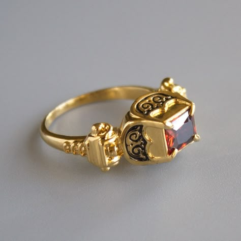 Renaissance ring with enamel and cubic zirconia stone.  This design was popular in 16th century Western Europe and you can find it in many portraits of that age as well as in museums. Our luxurious vintage ring can perfectly complete your Renaissance dress and become an eye-catcher on any medieval event. Each ring cast from Italian brass, plated with 24k gold and hand painted with black enamel. Gemstone is cubic zirconia, available colors: red, white (transparent), green, blue. Please choose you Medieval Ring, Medieval Rings, Historical Design, Medieval Jewelry, Western Europe, Rings Cool, Design Jewelry, Fantasy Jewelry, Finger Ring