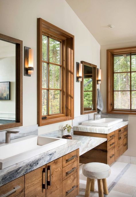 This spectacular rustic mountain retreat was designed by Altius Design Group and built by Malmquist Construction, located in Whitefish, Montana. Mountain Bathroom, One Kindesign, Modern English Country, Wash Room, Minnesota Home, Flat Panel Cabinets, Craftsman Style Home, Mountain Modern, Mountain Retreat