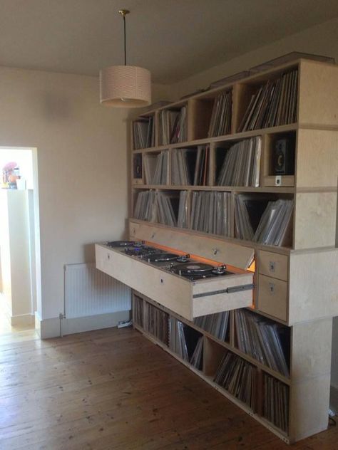 How cool is this? Custom record shelves with slide-out turntables! Music Wall Room, Music Room Ideas Decor, Music Decorations Room, Bedroom Decor Music, Music Bedroom Decor, Record Shelving, Band Room Decor, Dj Booth Ideas, Record Storage Ideas