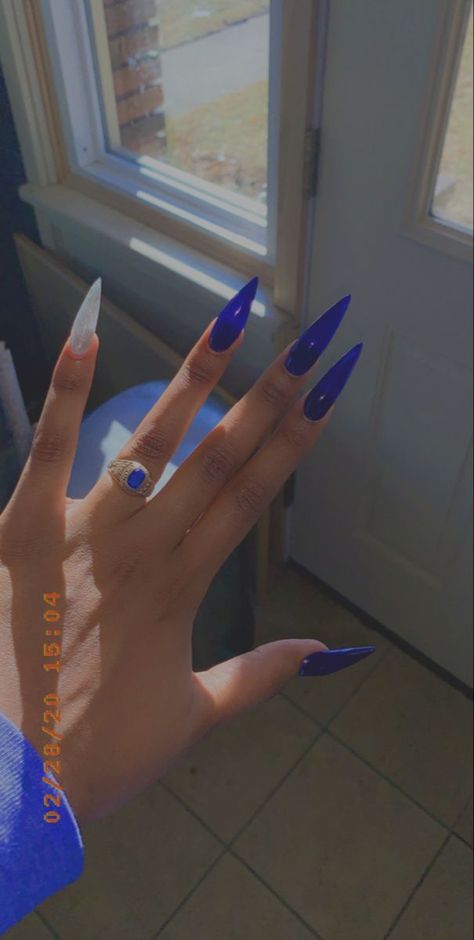 Blue stiletto Royal Blue Almond Acrylic Nails, Blue Stelito Nails, Royal Blue Nails Almond Shape, Royal Blue Nail Ideas For Prom, Blue Stilletos Nails, Royal Blue Sparkle Nails, Royal Blue Toe Nails, Royal Blue Stiletto Nails, Blue Fire Nails