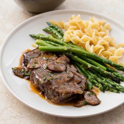 One-Pot Braised Blade Steaks with Mushrooms, Vidalias, and Steamed Asparagus | America's Test Kitchen Recipe Blade Steak Recipes, Blade Steak, Braised Steak, Roast Steak, Donut Toppings, Cookie Toppings, Steamed Asparagus, Caramel Tart, America's Test Kitchen Recipes