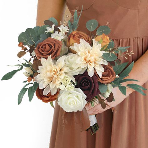 PRICES MAY VARY. Adds a touch of warmth and depth to your fall wedding: With its warm and rich colors, this bouquet adds a touch of warmth and depth to any fall wedding. It's a perfect way to incorporate the natural beauty of the season into your wedding decor. This artificial flowers bouquet is the perfect accessory for fall weddings. Its terracotta, cream, burgundy, and grey-green color scheme perfectly complements the autumnal hues that are often seen during this season. Resilient and long-la Sunflower And Orange Bouquet, Fall Wedding Flowers Bouquets, Wedding Bouquets Fall Rustic, Fake Flower Wedding Bouquet, Fake Flower Bridesmaid Bouquet, Diy Rustic Wedding Bouquet, Bridesmaid Fall Bouquet, Eucalyptus And Rust Wedding, October Bouquet Wedding