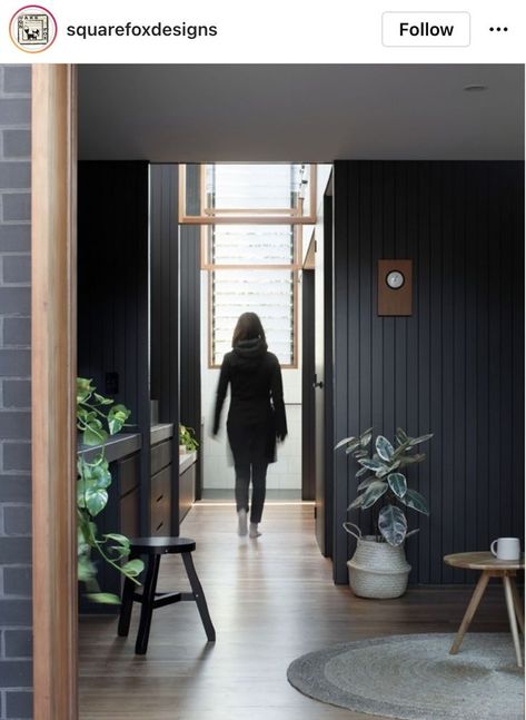 Greenery and black. Moody Coastal Home, Moody Beach House, Black Beach House, Moody Coastal, Brown Architecture, Moody Beach, Louvre Windows, Hallway Walls, Interior Design Dubai