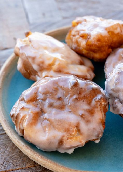 These delicious Air Fryer Apple Fritters are the perfect sweet snack! Packed full of tart apples and covered in an easy glaze, this dessert recipe will be your favorite way to warm up this fall. Apple Waffle Recipe, Air Fryer Apple Fritters, Donuts Filled, Homemade Apple Fritters, Apple Fritters Recipe, Breakfast Sides Dishes, Cinnamon Glaze, Fried Donuts, Big Families