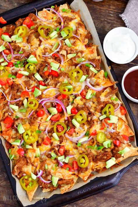 Simple pulled pork nachos where pork is the star. These nachos are loaded with delicious BBQ pulled pork, Colby-Jack cheese, pickled jalapenos, red onion and other fun toppings. Simple dish but it's satisfying every time! Bbq Nachos Recipe Pulled Pork, Bbq Nachos Recipe, Simple Pulled Pork, Pulled Pork Nachos Recipe, Pork Nachos Recipe, The Best Pulled Pork, Bbq Nachos, Best Pulled Pork, Pickled Jalapenos