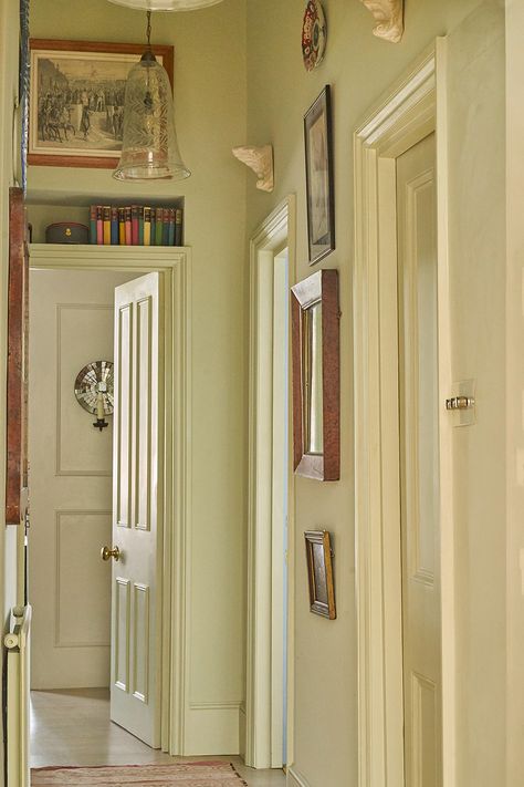 This London Apartment’s Color Palette Changes as the Light Does Emma Grant, Edward Bulmer, House Hallway, Marble Bistro Table, Victorian Apartment, Narrow Staircase, Natural Paint, Large Glass Jars, Black Backsplash