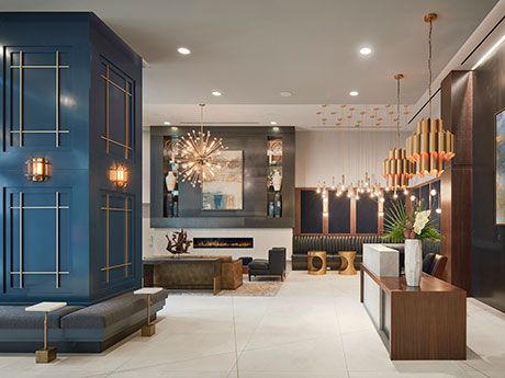 500-Unit Luxury Apartment Tower Opens in Chicago – REBusinessOnline Condo Lobby Design, Mid Century Modern Foyer, Modern Foyer Design, Modern Lobby, Modern Foyer, Mid Century Modern Interior Design, Mcm Design, Lobby Interior, Mid Century Architecture