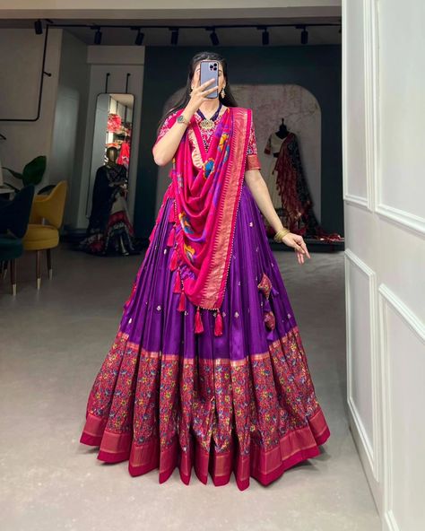 Rate : 1500 #apex__outfit Drape yourself in the elegance of Tussar Silk Lehenga, where print tells a story of timeless beauty and sophistication🌷 Lehenga(Stitched) : Lehenga Fabric : Tussar Silk Lehenga Work : Print With Foil Work Lehenga Waist : SUPPORTED UP TO 42 Lehenga Closer : Drawstring With Heavy Tassels and Zip Stitching : Stitched With Canvas and attached with Can Can Length : 42 Flair : 3.80 Meter Inner : Micro Cotton Blouse(Unstitched) : Blouse fabric : Tussar Silk Blouse Work... Pink Purple Lehenga, New Lehenga Design, Dress Illustration Design, Purple Lehenga, Bollywood Designer Sarees, Lehenga Crop Top, Designer Bridal Lehenga Choli, Choli Dress, Lehenga Choli Wedding