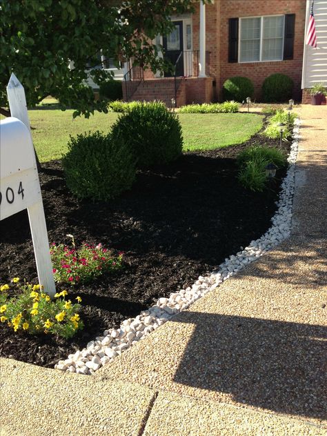 Black mulch and river rocks   I LOVE this look for the sidewalk~ Cheap Landscaping, Mailbox Landscaping, Rock Landscape, Mulch Landscaping, River Rock Landscaping, Small Yards, Rock Landscaping, Easy Landscaping, Meteor Garden 2018