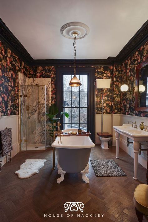 Dark black and pink floral bathroom with blue vintage bathtub and wooden floors. Dark Floral Bathroom, Vintage Style Bathroom, House Of Hackney, Victorian Townhouse, London Townhouse, Floral Bathroom, Victorian Bathroom, Midnight Garden, Bedroom Pictures