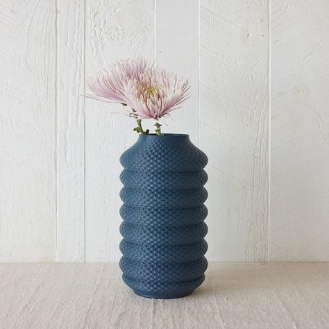 Plastic is famously under-recycled—as little as 9% gets reused!—and these vases are a stunning solution. Each one is designed in Montréal and 3D printed from traceable recycled plastic, supporting a more circular economy. (You can even ship it back if you need, and it’ll be fully recycled.) Pick your preferred shape and prepare to make a visual statement. 3D printed recycled plastic. Zero-waste circular design. Designed and printed in Montréal. Made to order. Cyrc 3D Printed Vase Collection - Ra Circular Objects, 3d Printed Vase, 3d Printing Flower Pot, Rattan Vase, 3d Print Pot Plants, 3d Printed Self Watering Planter, 3d Printed Flower Vase, 3d Printing Pots & Planters, Plastic Vase