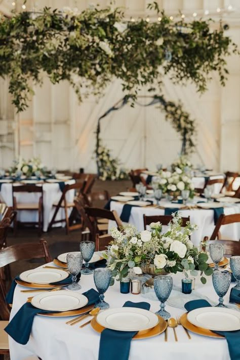 Navy And Dusty Blue Wedding Table Setting, Wedding Blue Reception, Blue Velvet Winter Wedding, Satin Blue Wedding Theme, Dinnerware Wedding Table Settings, Vintage Blue And Gold Wedding, Table Runner Circle Table Wedding, Blue Water Goblets Wedding, Blue And Green Wedding Table Settings