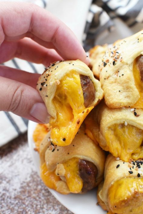 Easy Tailgating Recipe! These perfectly cooked Johnsonville Bratwurst are tucked into buttery crescent dough w/ cheddar cheese, & baked to perfection. Cheese Bratwurst Recipes, Cheddar Bratwurst Recipes, Cheddar Brats Recipes, Brat Recipes, Johnsonville Sausage Recipes, Easy Tailgate Food, Brat Sausage, Gameday Food, Brats Recipes