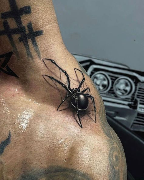 Unravel the mysteries of spider tattoos! Dive into rich cultural meanings, trending designs, and expert insights to find your perfect spider ink! Black And Grey Spider Tattoo, Spider Tattoo Realism, Spider Floral Tattoo, Spider On Shoulder Tattoo, Spider's Web Tattoo, Realism Spider Tattoo, Spider On Hand Tattoo, Spider On Web Tattoo, Spider Shoulder Tattoo