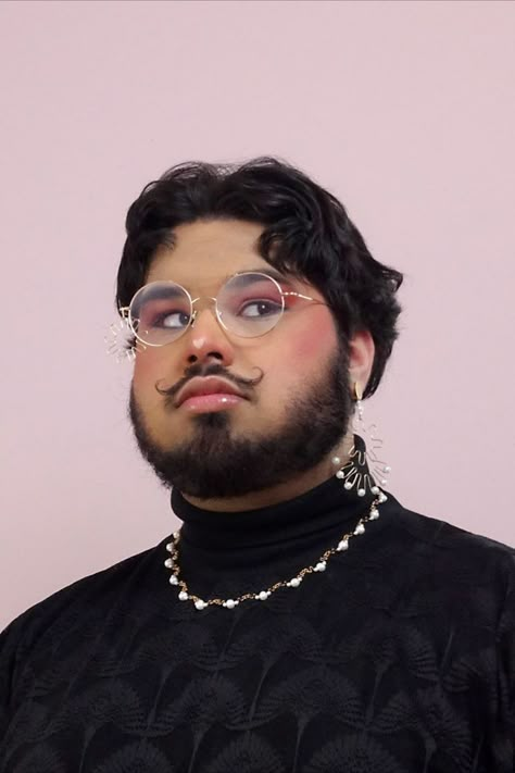 Queer, gay designer, profile picture inspo, moody, masculine, feminine, flower sparkle jewelry, regal pearls, makeup glasses. bear, bearded mesh turtle neck. behance, LinkedIn Face Profiles Reference, Queer Character Design, Queer Portrait Photography, Designer Profile Picture, Male Profile Reference, Portrait Inspiration Faces, Interesting Faces To Draw, Profiles Drawings, Masculine Portrait