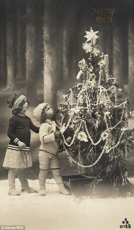 A French Christmas greeting postcard, with Joyeux Noel inscription and image of children playing with a Christmas tree Postcards Christmas, Images Noêl Vintages, Christmas In Italy, Vintage Christmas Photos, French Christmas, Vintage Christmas Images, London Christmas, Christmas Parade, Old Christmas