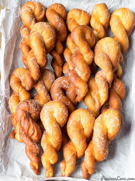 These African doughnuts are soft, pillowy, fluffy on the outside with incredible flavor! Perfect for snacking, breakfast or entertaining. And the twists are such fun shapes. Malva Pudding, Banana Fritters, Doughnut Recipe, Donut Recipes, African Food, Beignets, Breakfast Brunch, Donuts, Biscuits