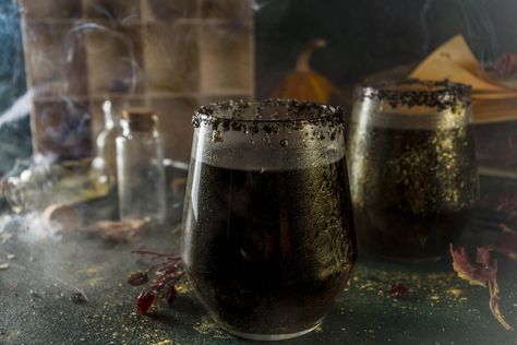 How to make Witches Brew Black Sangria - complete recipe, ingredients, cook time and serving size. Midnight Margaritas Practical Magic, Make Witches, Black Sangria, Halloween Themed Drinks, Midnight Margaritas, Halloween Drink, 30 Minute Dinners, Themed Drinks, Halloween Cocktails