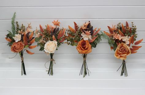 "The bouquets are created from artificial flowers and greenery of high quality. All dimensions are total length or width. The width - 5\"( 13 cm) The height - 11\" ( 28cm) Flowers for the arch are here: https://www.etsy.com/listing/1107692186/terracotta-cream-arch-arrangement-arch?click_key=c4f68aae89968f17c14bffea5b668ea271d75c8c%3A1107692186&click_sum=87056110&ref=shop_home_active_36&frs=1&crt=1&sts=1 The bouquet is here:  https://www.etsy.com/listing/1121635853/boho-bouquet-pampass-grass-oran Terracotta Rust Bouquet, Terracotta Bouquet Bridesmaid, Fall Bridesmaid Flowers Bouquets, Bridesmaid Bouquet Terracotta, Small Fall Bouquet, Fall Floral Arrangements Wedding, Rust Wedding Decor, Fall Bridesmaid Bouquet, Terracotta Wedding Flowers