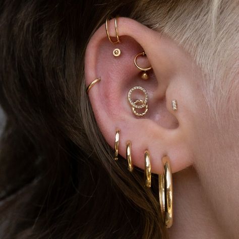 F R E S H G L A M O U R Stacked with our finest cyclical designs, this curation speaks to the curve of limitation and where it can take us ♾️ Ear Curation, Pierced Jewelry, Ear Jewelry, Piercing Jewelry, Earings Piercings, Ear Piercings, Piercings, Necklaces, Fish