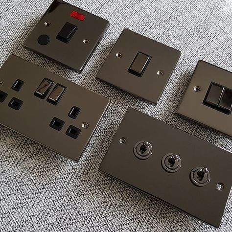 Our Black Nickel raised plate range are beautifully crafted with a sleek profile. Each plate has a polished black nickel shiny finish. Plate Dimensions. 1 Gang Plug Socket - 88 x 88 x 8mm. 2 Gang Plug Socket - 148 x 88 x 8mm. Fits into a 25mm - 35mm standard UK wall back box. Supplied with colour coded fixing screws  plastic gasket. Full fitting instructions included. Long-life design and unprecedented value for money make this the ultimate product for you. All items in this range are tested and Black Light Switch, Dimmer Light Switch, Light Switches And Sockets, Plug Sockets, Own Apartment, Switches And Sockets, Boy’s Room, Toggle Light Switch, Light Switches