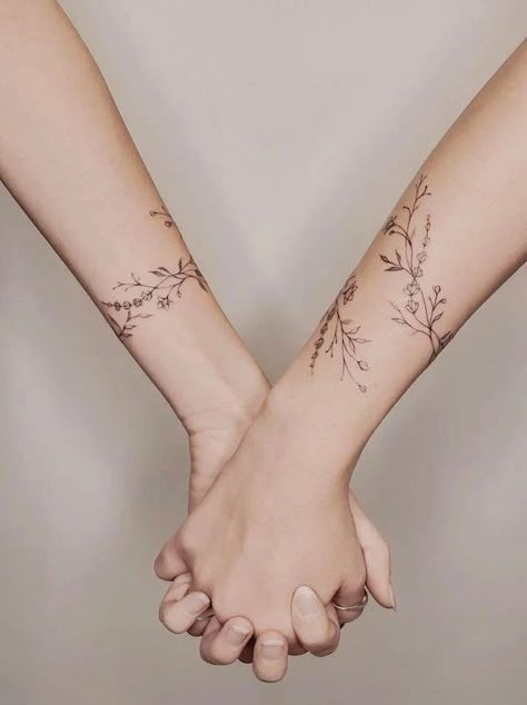 Floral Tattoo Around Arm, Similar Tattoos For Sisters, Sister Floral Tattoo, Matching Fine Line Tattoos For Sisters, Minimalist Dogwood Tattoo, Bridesmaid Tattoo Ideas, Matching Line Art Tattoos, Matching Vine Tattoos, Boho Sister Tattoos