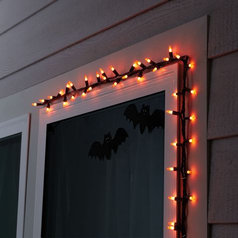 Find this 50ct. Orange Mini String Lights by Ashland® at Michaels. This orange light set is the perfect way to add an eerie glow to your front yard, porch or Halloween party décor. Bring spooky fun to your space with these string lights. This orange light set is the perfect way to add an eerie glow to your front yard, porch or Halloween party décor. Details: Orange lights with black wire 10.5 ft. (3.2 m) lighted length 12 ft. (3.6 m) total length Plug-in with end-to-end connection UL certified T Halloween Party Lighting, Front Yard Porch, Halloween Bonfire, Backyard Halloween Party, Orange String Lights, Halloween String Lights, Mini String Lights, Orange Light, Halloween Lights