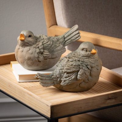 These matching bird figurines are the perfect pair to add to any spring or easter decor, and are cute enough to leave on display through all four seasons! Made of quality resin, these neutral gray and blush-colored bird figures make any room more cheerful. | Clover Lane 6.25" Blushing Bird Figurine Set of 2, Resin gray/Yellow 6.25 x 8.75 x 5.5 in | Home Decor | CRLJ2143 | Wayfair Canada Bird Ceramics, Animal Clay, Clay Bird, Clay Birds, Bird Figurines, Modelling Clay, Rock Garden Design, Science Crafts, Bird Figure