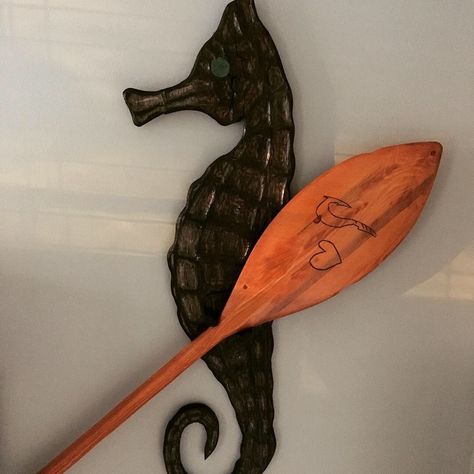 I made this custom carved sea horse to hold the Moana paddle I made.  I did an epoxy pour for the eye to look like the heart of te fiti Moana Paddle, The Heart Of Te Fiti, Epoxy Pour, Heart Of Te Fiti, Te Fiti, Woodworking Software, Custom Carved, Sea Horse, Moana