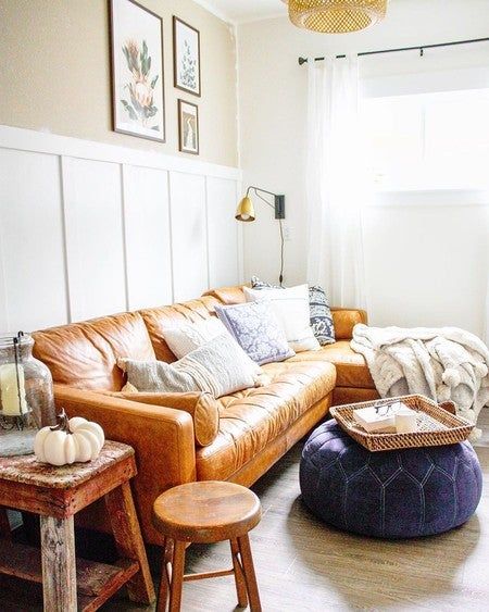 It’s time to relax 🛋 Styled by @brightyellowdoor Chaise Pillow Arrangement, Cozy Living Rooms With Leather Couches, Leather Couch With Ottoman, Modern Wainscoting Ideas, Couch Ottoman, Tassel Rug, Mid Century Modern Sectional Sofa, Leather Chaise Lounge, Brown Leather Couch