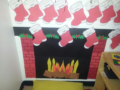 Fireplace made from construction paper. The perfect Cozy Corner! Construction Paper Fireplace, Classroom Fireplace, Snoopy Classroom, Holiday Door Decorations, Classroom Christmas Decorations, Winter Bulletin, Christmas Classroom Door, Class Door, School Door Decorations