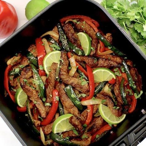 Air Fryer Steak Fajitas These Air Fryer Steak Fajitas are made with perfectly seasoned strips of steak and a colorful medley of tender peppers and onions. Conveniently cooked in the air fryer, this is a quick and easy recipe, perfect for a busy weeknight dinner. #airfryerfajitas #airfryersteak #airfryerdinners #airfryerketo Keto Friendly Dinner Recipes, Keto Steak Recipes, Air Fryer Steak Fajitas, Airfryer Steak, Air Fryer Dinners, Cheesy Mashed Cauliflower, Easy Fish Dinners, Keto Steak, Air Fryer Steak