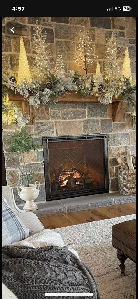 Wood Mantle Christmas Decor, Tree By Fireplace Christmas, Simple Christmas Mantle Stone, Rock Fireplace Christmas Decor, Christmas Mantle With Small Trees, Christmas Tree Mantle Ideas, Christmas Mantle Trees, Christmas Tree Fireplace Decor, Country Christmas Mantle Ideas