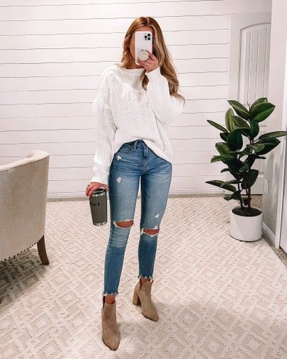 Outfits To Wear In Germany Fall, Tall Boots And Jeans Outfit, Fall Jeans Outfit Casual Ankle Boots, Cute Winter Outfits 2023, Light Colored Jeans Outfit Winter, Straight Leg Jeans White Booties, Trendy White Winter Booties, Cute Jean Outfits Winter, Ripped Light Wash Cropped Jeans For Fall