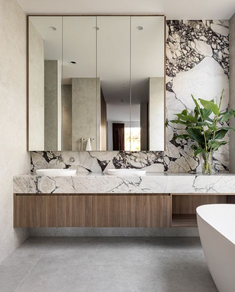 We are in love with the elegance and luxury of this bayside home ✨ The luxurious, mid-century house built by our talented customer @mazzeihomes is the grand prize in the @rmhhomelottery with proceeds supporting @theroyalmelbournehospital.   🛁 Omvivo Villa Basin, Scala tapware and Milli Mood shower and accessories in brushed nickel.   🏠 @mazzeihomes ✏️ @websterarchitecture 🌿 @nathanburkett.nbla 📷 @dylanjamesphoto Large Bathroom Mirror, Marble Calacatta, 15 Aesthetic, Large Bathroom Mirrors, Modern Residential Architecture, Large Bathroom, Stone Gallery, Bathroom Spa, Large Bathrooms