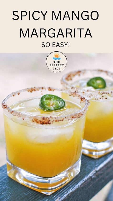 orange boozy drink with tajin rim and jalapeno garnish Margarita Recipes For A Crowd, Spicy Mango Margarita Recipe, Margarita Recipes On The Rocks, Spicy Mango Margarita, Mango Jalapeno Margarita, Mango Margarita Recipe, Recipes Mango, Spicy Margarita Recipe, Puree Recipes