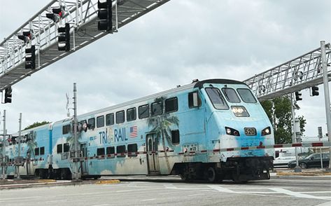 Fueled by a new federal grant, Tri-Rail is on track to replace nearly a third of its engines and passenger cars with brand-new equipment. “I don’t use the word gamechanger often, but this is a gamechanger,” said David Dech, the veteran railroad executive who last year became executive director of Tri-Rail’s parent, the South Florida Regional Transportation Authority. The federal government announced Friday that the 72-mile-long rail service linking Miami-Dade, Broward and Palm Beach… Ep Ep, Economies Of Scale, Rapid Transit, Downtown Miami, Miami Dade, Rolling Stock, Federal Government, Palm Beach County, Executive Director