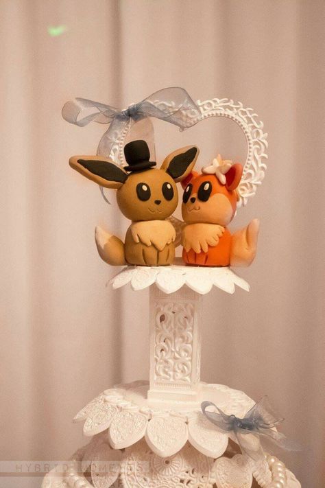 Pokémon wedding cake topper Goeglein's, Fort Wayne, IN Wedding Pokemon, Pokemon Theme Wedding, Pokemon Engagement, Pokemon Wedding Cake, Pokemon Wedding Cake Toppers, Nerd Wedding Cake, Animal Crossing Wedding Cake Topper, Geek Cake, Pokemon Wedding