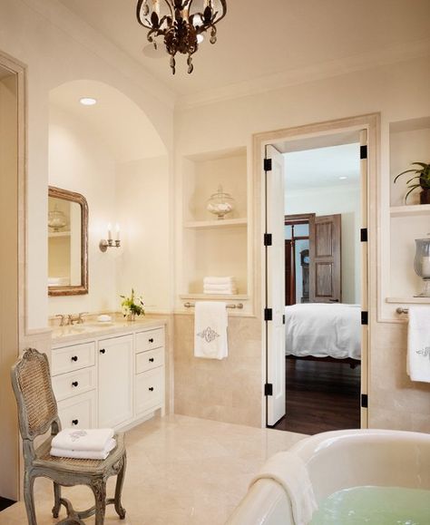 Dillon Kyle Architecture: Elegant bathroom with freestanding bath tub. Arched alcove with built-in vanity, gilt ... Crema Marfil Bathroom, Cream Marble Bathroom, Arched Alcove, Mediterranean Bathroom Design Ideas, Bathroom Mediterranean, Santa Barbara Style Homes, Crema Marfil Marble, Built In Vanity, Mediterranean Bathroom