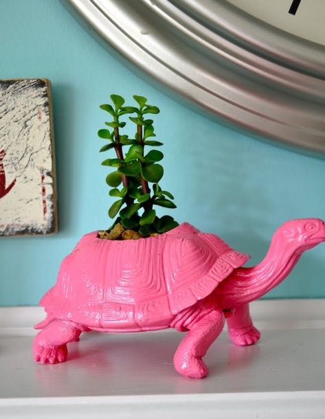 12 Upcycled Planters You Can Make From Stuff You Have at Home via Brit + Co Upcycled Planter, Succulent Planter Diy, Dino Toys, Planter Project, Animal Planters, Diy Simple, Plastic Toys, Diy Planters, Succulents Diy