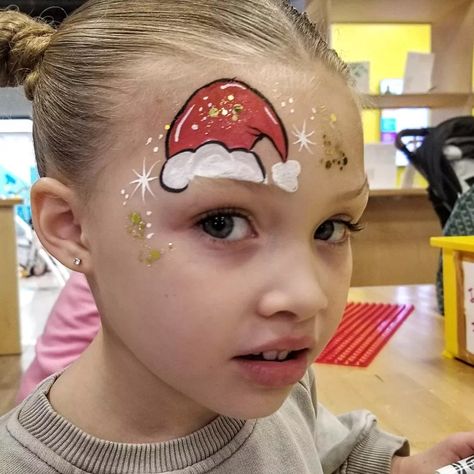 Santa Hat Face Paint, Santa Face Painting, Face Painting Ideas Christmas, Kids Easy Face Painting Ideas, Kids Christmas Face Paint, Christmas Facepainting Ideas, Xmas Face Paint, Simple Christmas Face Painting For Kids, Face Painting Ideas For Kids Christmas