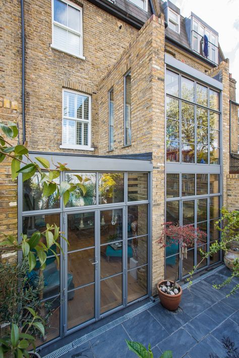 Double height house | A HG project in Double height crittall style glazed extension with a single spine bespoke staircase.  www.hollandgreen.co.uk #extension #architecture #glazed Glazed Extension, Crittal Doors, Bespoke Staircases, Crittal Windows, Glass Extension, Lots Of Windows, Double Height, Eclectic House, House Extension Design